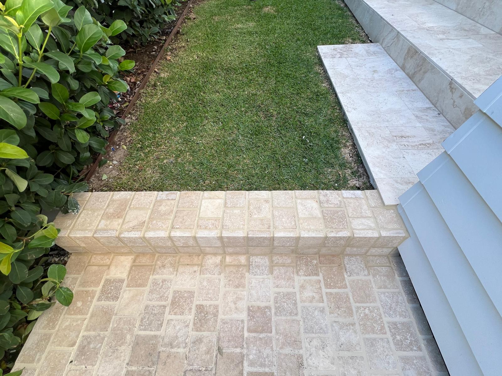 Custom outdoor tiled steps and garden edging
